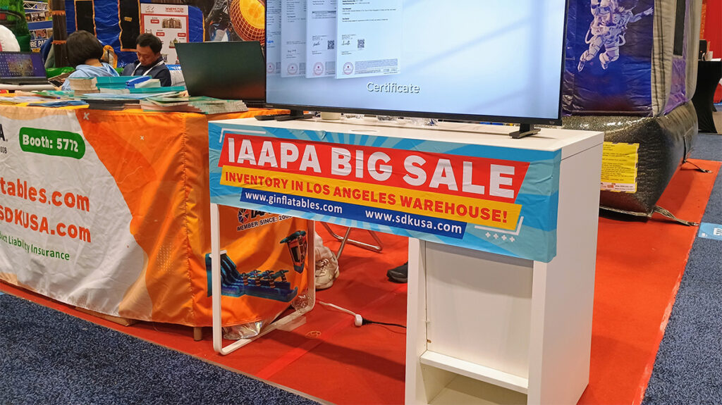 A booth selling inflatables at the IAAPA expo